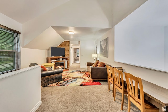 1343 S 200 E, Farmington, UT 84025 - living area featuring lofted ceiling, carpet, a brick fireplace, and baseboards