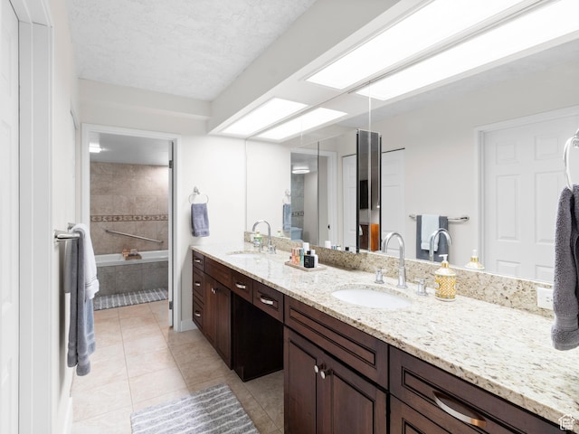 141 E Second Ave N Unit 502, Salt Lake City, UT 84103 - full bathroom featuring tile patterned flooring, double vanity, tiled bath, and a shower