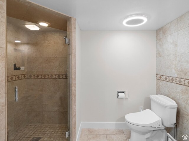 141 E Second Ave N Unit 502, Salt Lake City, UT 84103 - full bath featuring toilet, tile patterned flooring, and a stall shower