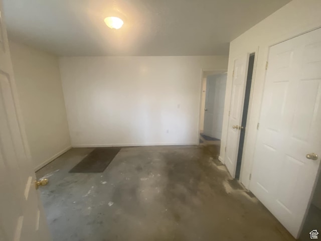 50 S 400 E, Myton, UT 84052 - unfurnished room with unfinished concrete flooring and baseboards