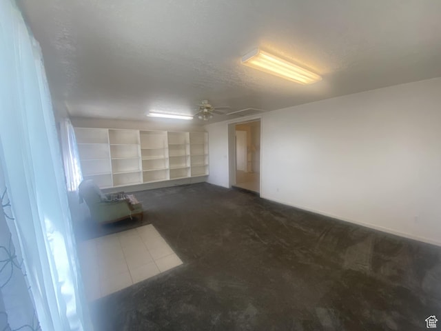50 S 400 E, Myton, UT 84052 - spare room with dark colored carpet and dark tile patterned floors