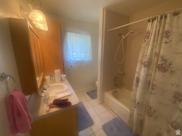 50 S 400 E, Myton, UT 84052 - bathroom featuring tile patterned floors, shower / bath combo with shower curtain, vanity, and toilet