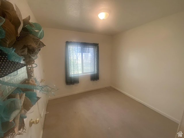 50 S 400 E, Myton, UT 84052 - unfurnished bedroom featuring baseboards and carpet flooring