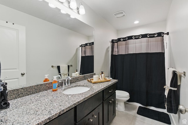 bathroom with tile patterned floors, toilet, vanity, curtained shower, and recessed lighting