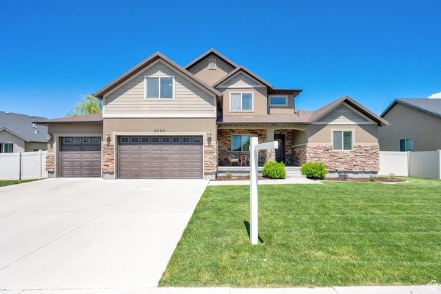 view of front facade with stone siding, concrete driveway, stucco siding, and a garage