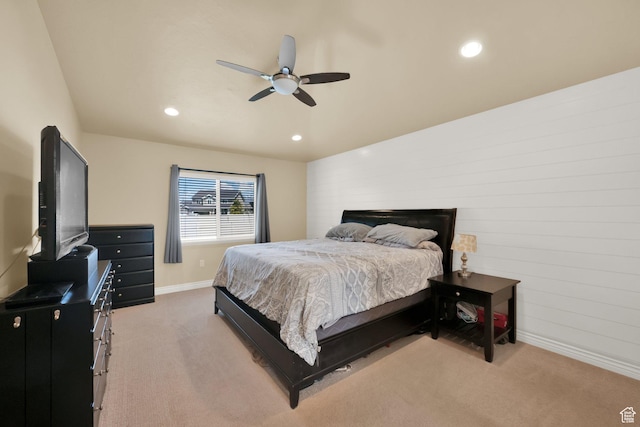 bedroom featuring light carpet, baseboards, recessed lighting, and a ceiling fan