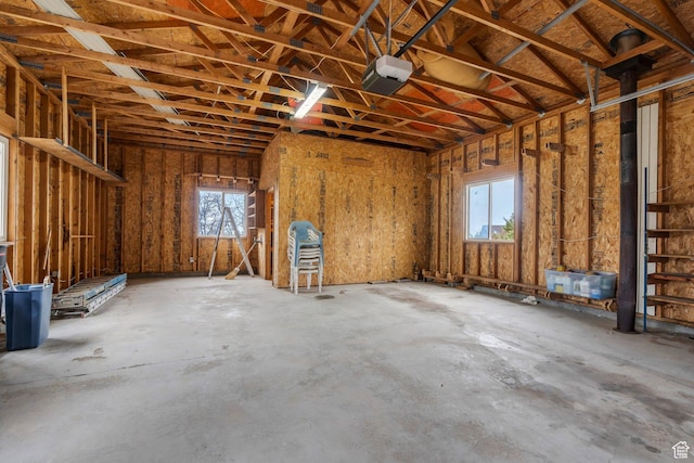 misc room with healthy amount of natural light and a garage