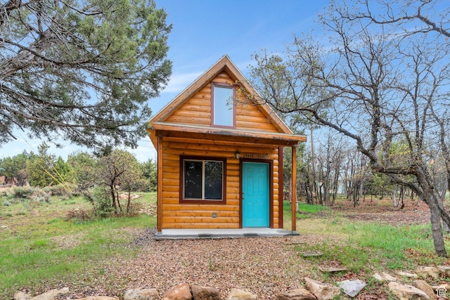 view of outbuilding with an outdoor structure