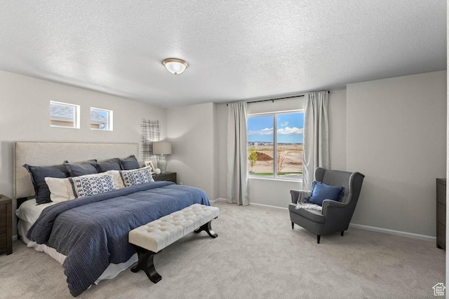 351 N Riverside Dr Unit 978, Saratoga Springs, UT 84045 - bedroom featuring multiple windows, light carpet, a textured ceiling, and baseboards