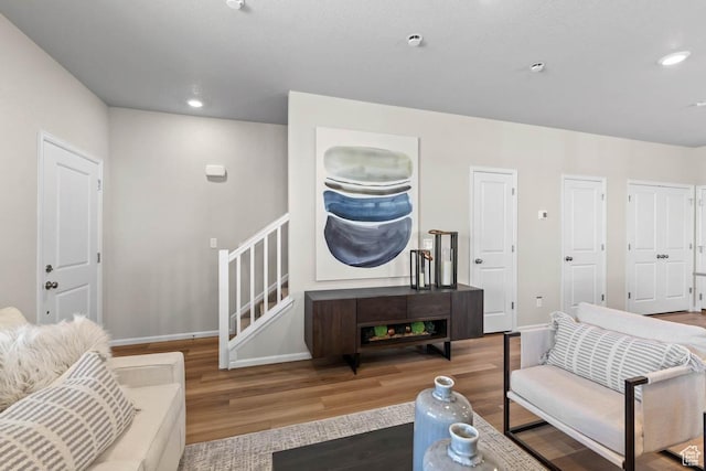 351 N Riverside Dr Unit 978, Saratoga Springs, UT 84045 - living area featuring wood finished floors, baseboards, stairway, and recessed lighting