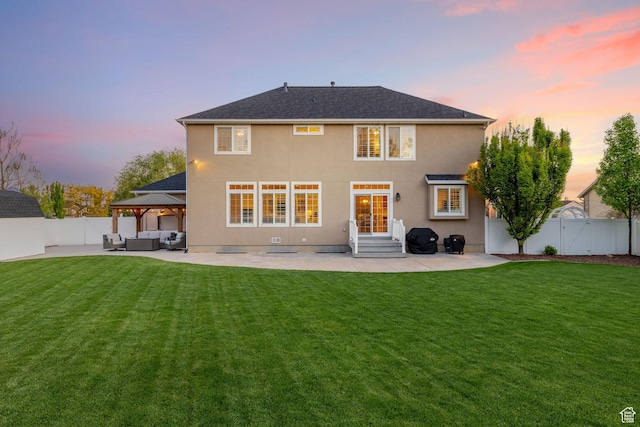 512 Glendon Way, Pleasant Grove, UT 84062 - back of house at dusk featuring an outdoor hangout area, a patio area, a gazebo, and entry steps