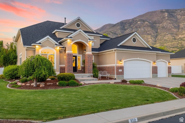 512 Glendon Way, Pleasant Grove, UT 84062 - view of front of home with a lawn, a garage, concrete driveway, and stucco siding