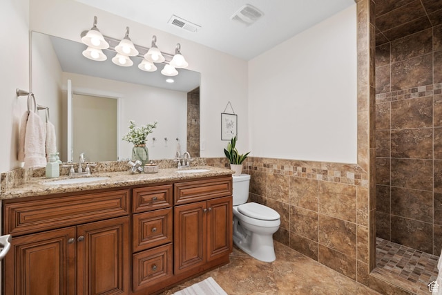 512 Glendon Way, Pleasant Grove, UT 84062 - full bathroom with tile walls, toilet, a walk in shower, double vanity, and wainscoting