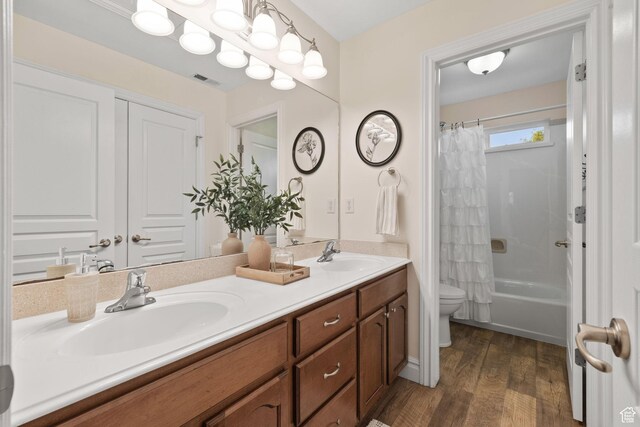 512 Glendon Way, Pleasant Grove, UT 84062 - full bath featuring toilet, double vanity, wood finished floors, and shower / tub combo with curtain