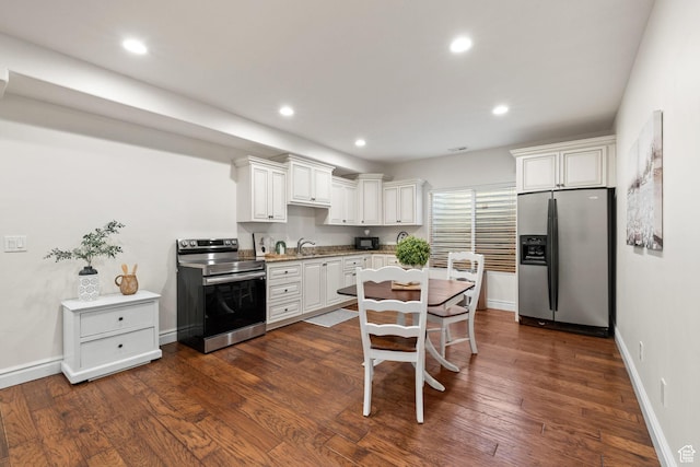 512 Glendon Way, Pleasant Grove, UT 84062 - kitchen with appliances with stainless steel finishes, dark wood finished floors, white cabinetry, recessed lighting, and a sink