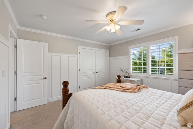 512 Glendon Way, Pleasant Grove, UT 84062 - bedroom with carpet, crown molding, two closets, a decorative wall, and wainscoting