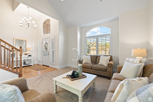 512 Glendon Way, Pleasant Grove, UT 84062 - living room with a chandelier, high vaulted ceiling, stairway, and baseboards