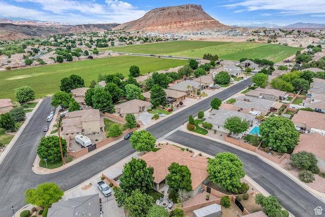 aerial perspective of suburban area featuring a mountain backdrop
