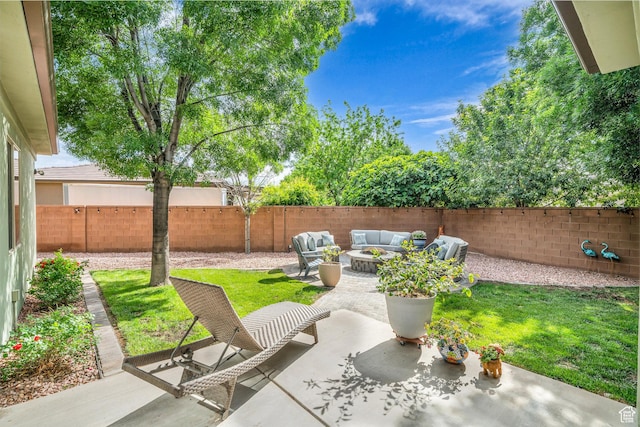 view of patio / terrace featuring an outdoor living space and a fenced backyard