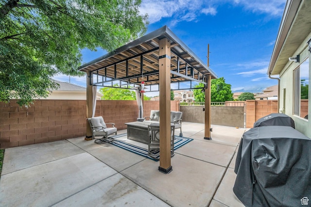 view of patio / terrace featuring area for grilling and a fenced backyard