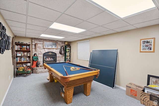 game room with carpet, a fireplace, billiards table, a drop ceiling, and baseboards