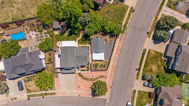 aerial overview of property's location with nearby suburban area