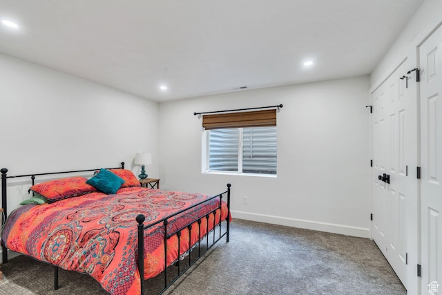 bedroom with carpet flooring, baseboards, and recessed lighting