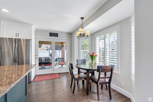 dining area featuring french doors, dark wood-style floors, a chandelier, baseboards, and recessed lighting