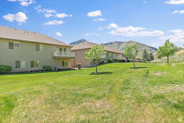 3123 E Canyon Glen Loop S, Spanish Fork, UT 84660 - view of grassy yard with a mountain view and a balcony