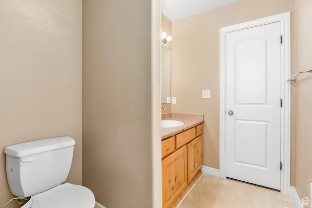 3123 E Canyon Glen Loop S, Spanish Fork, UT 84660 - half bath featuring baseboards, vanity, tile patterned floors, and toilet