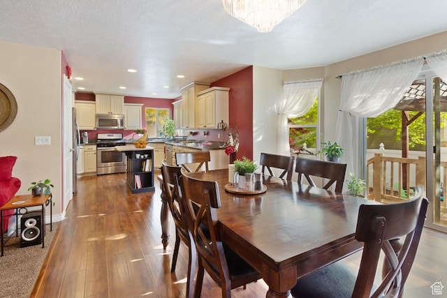 1768 N 200 W, North Ogden, UT 84414 - dining area with wood finished floors, recessed lighting, baseboards, and a chandelier