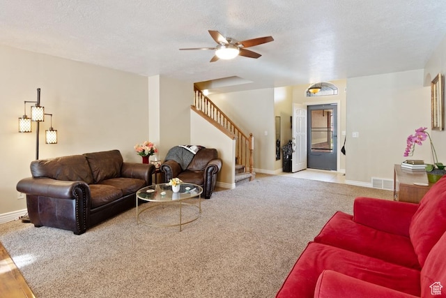 1768 N 200 W, North Ogden, UT 84414 - living area featuring stairs, ceiling fan, baseboards, a textured ceiling, and carpet floors