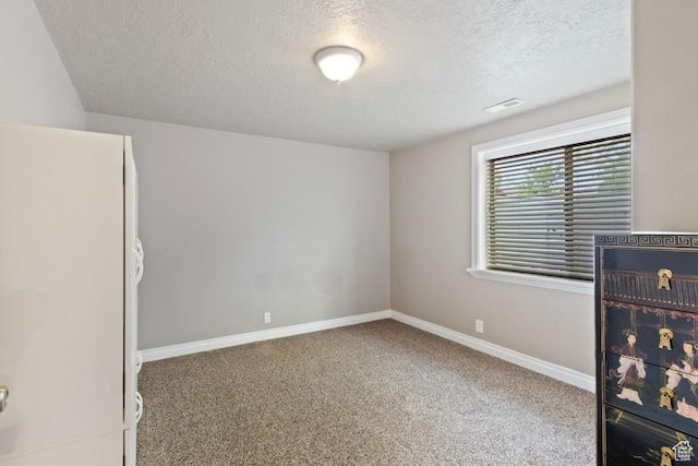 1768 N 200 W, North Ogden, UT 84414 - carpeted empty room with a textured ceiling and baseboards