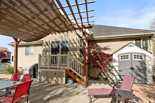 1768 N 200 W, North Ogden, UT 84414 - rear view of property featuring outdoor dining space, a patio area, a shed, roof with shingles, and an outbuilding