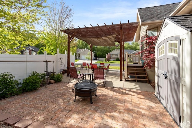 1768 N 200 W, North Ogden, UT 84414 - view of patio / terrace featuring a fire pit, fence, a pergola, and outdoor dining area