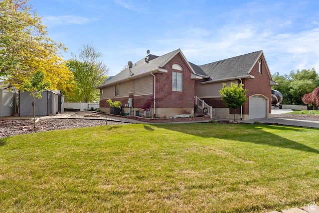 1768 N 200 W, North Ogden, UT 84414 - view of home's exterior with brick siding, a garage, a storage shed, an outbuilding, and roof with shingles