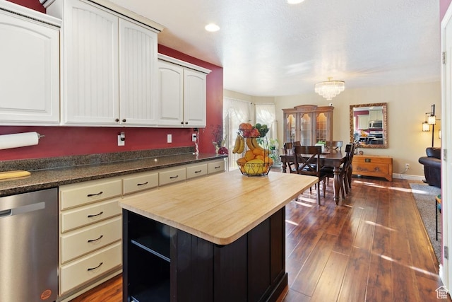 1768 N 200 W, North Ogden, UT 84414 - kitchen featuring appliances with stainless steel finishes, dark wood-style floors, wood counters, and a kitchen island