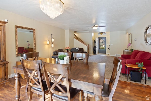 1768 N 200 W, North Ogden, UT 84414 - dining room with stairs, a ceiling fan, and baseboards
