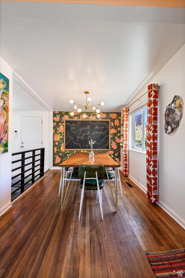 944 N 1400 W, Salt Lake City, UT 84116 - dining area with a chandelier, baseboards, and wood finished floors