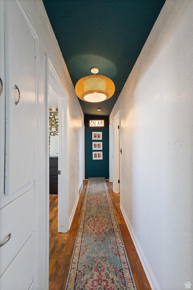 944 N 1400 W, Salt Lake City, UT 84116 - hallway featuring wood finished floors, baseboards, and a textured wall