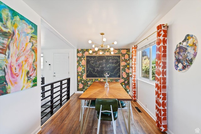 944 N 1400 W, Salt Lake City, UT 84116 - dining room with baseboards, wood finished floors, and a chandelier