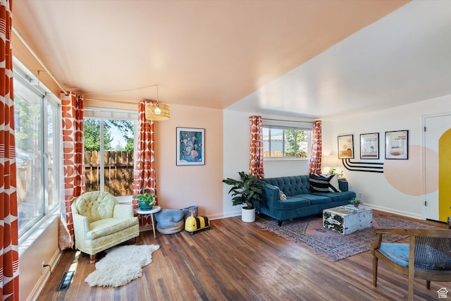 944 N 1400 W, Salt Lake City, UT 84116 - living area featuring wood finished floors, plenty of natural light, and baseboards