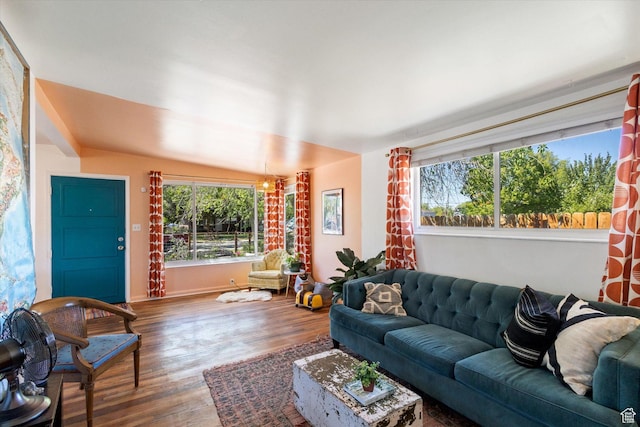 944 N 1400 W, Salt Lake City, UT 84116 - living area with wood finished floors, vaulted ceiling, and baseboards