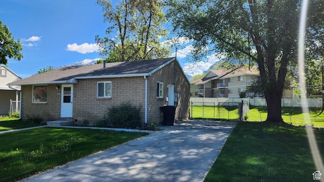 view of front facade with concrete driveway and entry steps