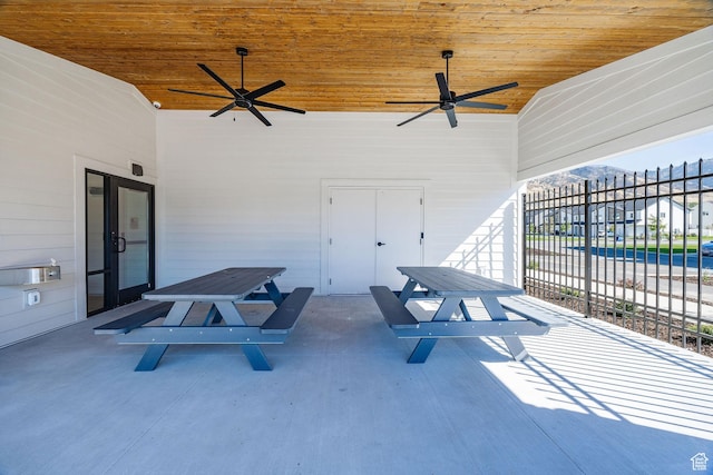 view of patio with ceiling fan and outdoor dining area