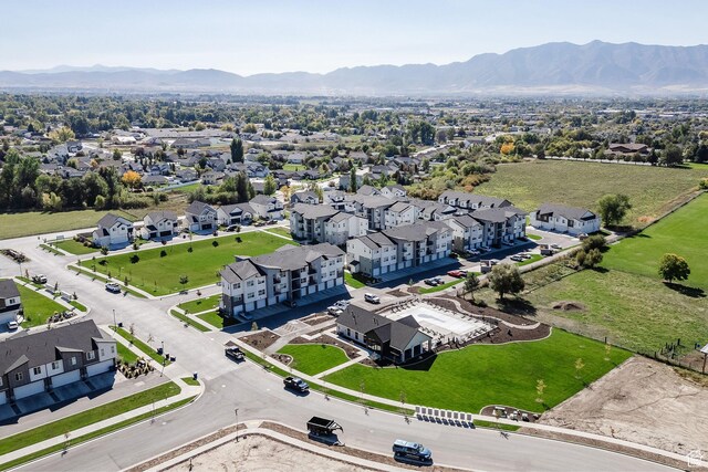 aerial perspective of suburban area featuring a mountainous background