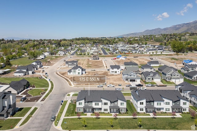 aerial perspective of suburban area with a mountain backdrop