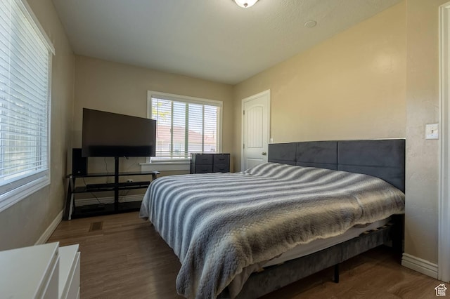 3119 S 9000 W, Magna, UT 84044 - bedroom featuring wood finished floors and baseboards