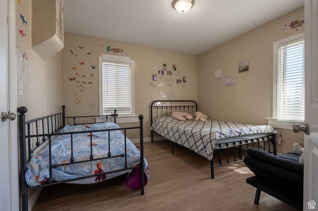 3119 S 9000 W, Magna, UT 84044 - bedroom with wood finished floors and baseboards