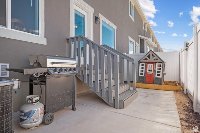 view of patio with fence